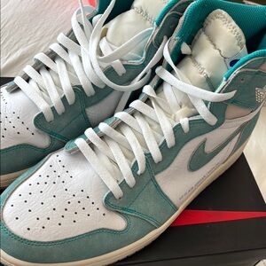 Air Jordan’s Teal and White High-Top Sneakers 14